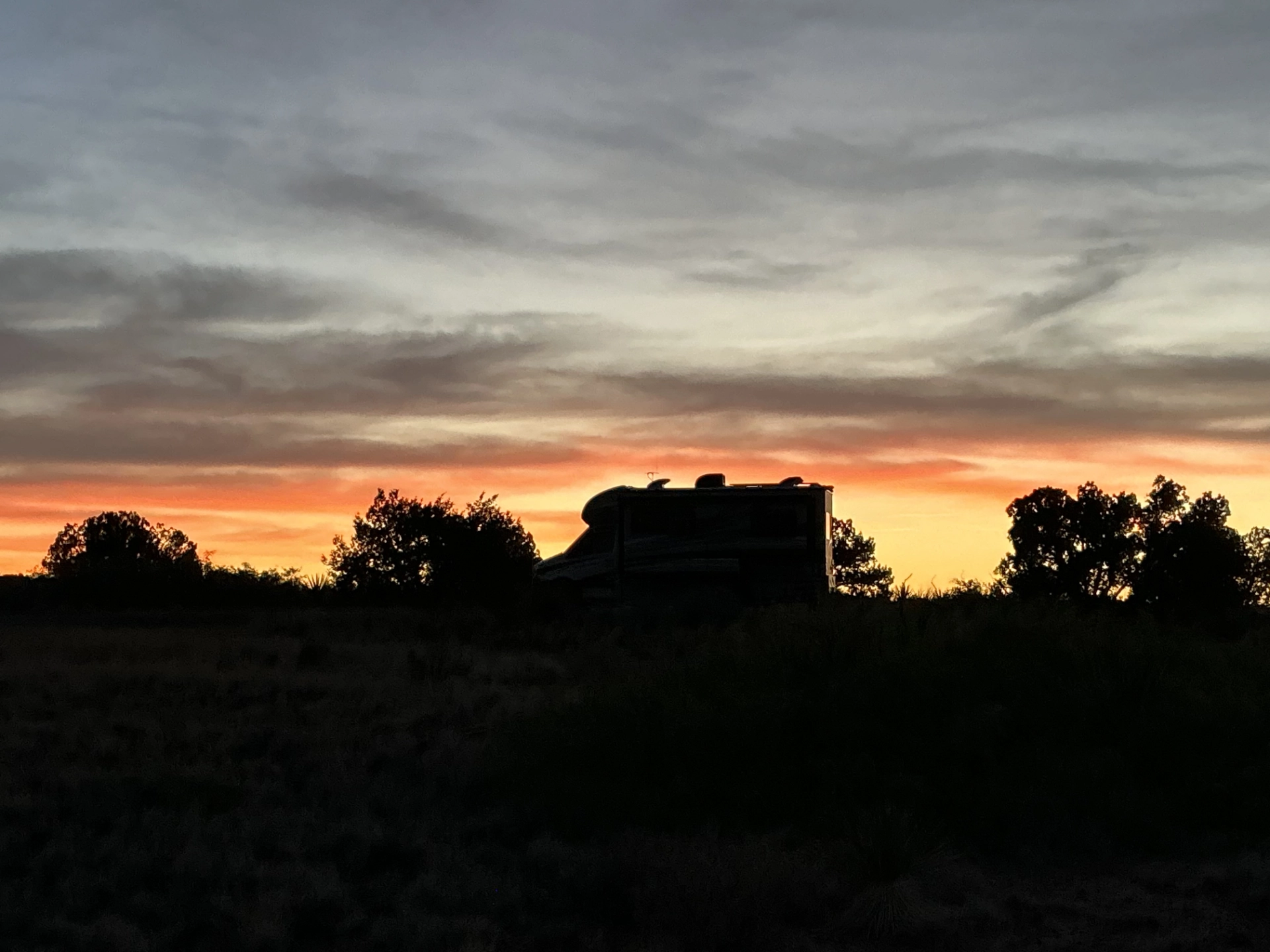 RV silhouette at sunset