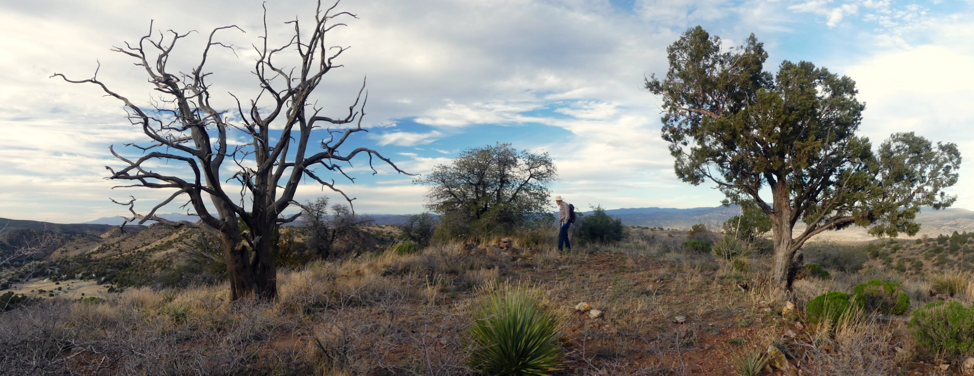 hiking across an open rocky summit