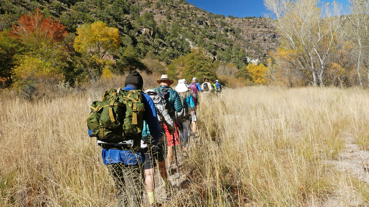 group hiking in canyon