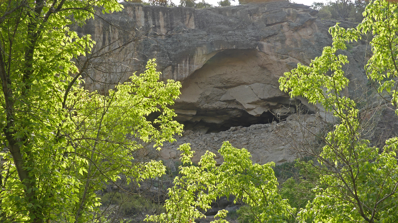 cliff dwelling with collapsed wall