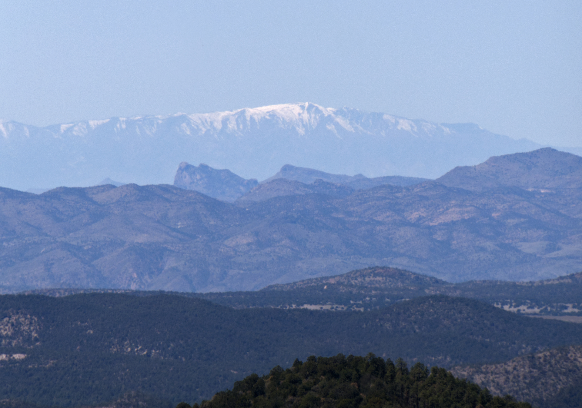 distant view of Mount Graham in snow