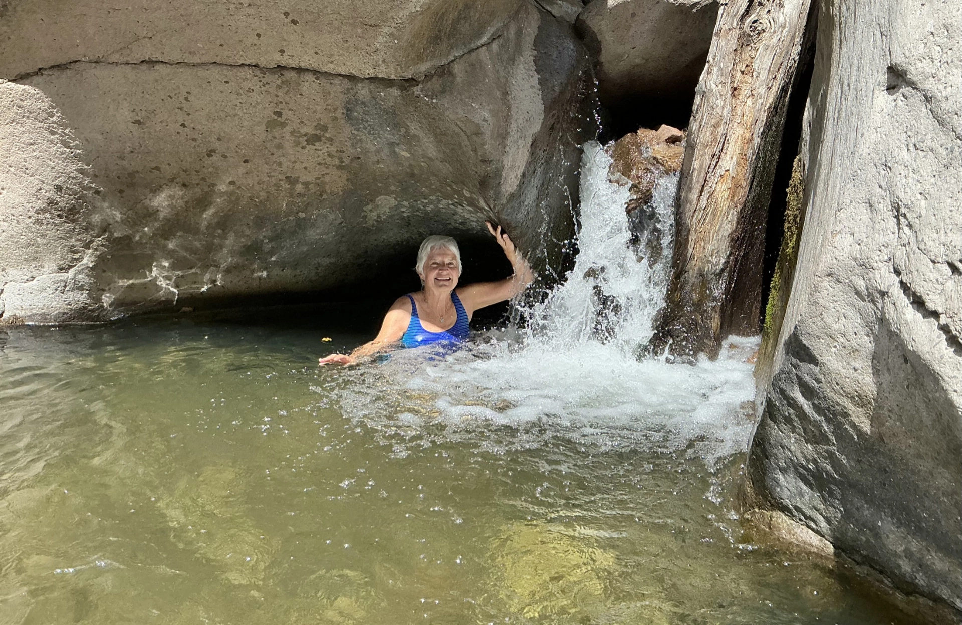 in a pool next to a small waterfall on Whitewater Creek