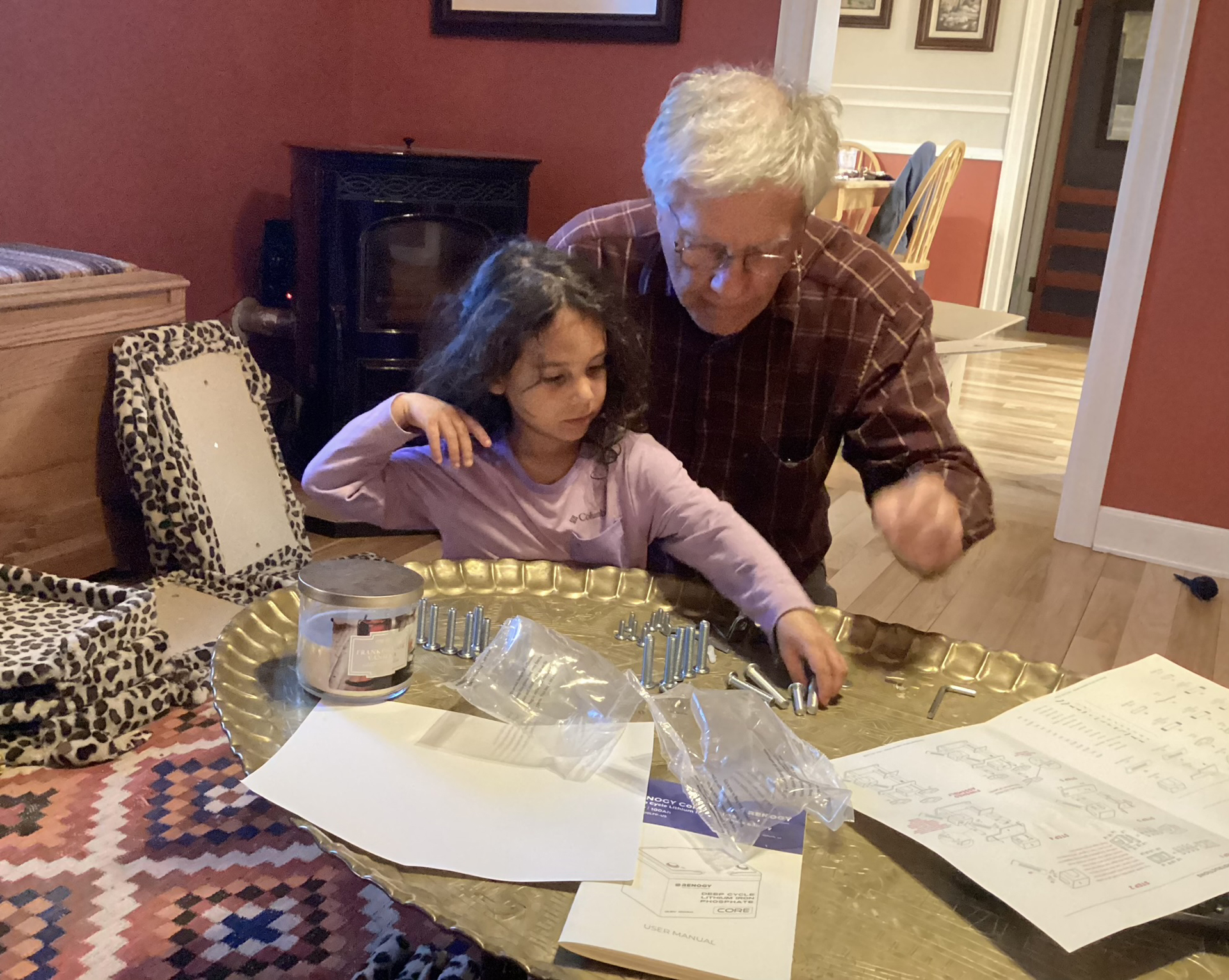 Dennis and CC laying out the pieces of the cat tower