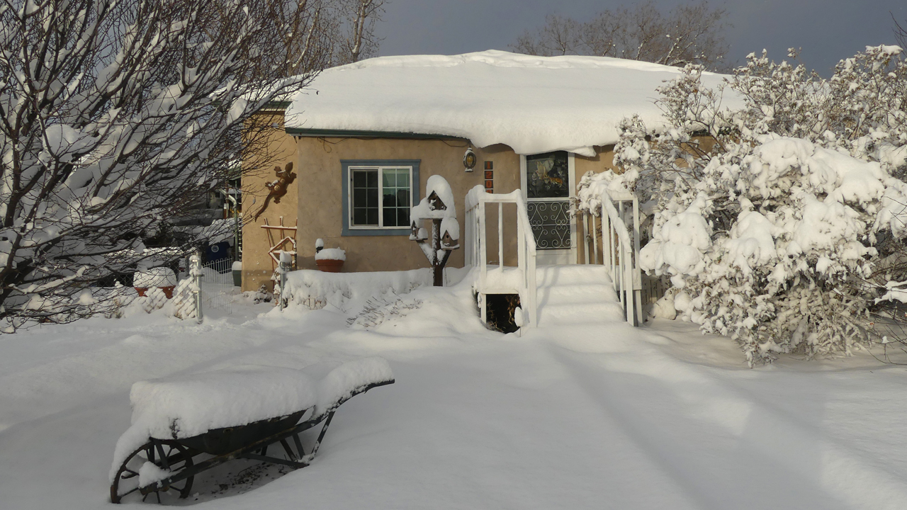 our house covered in snow