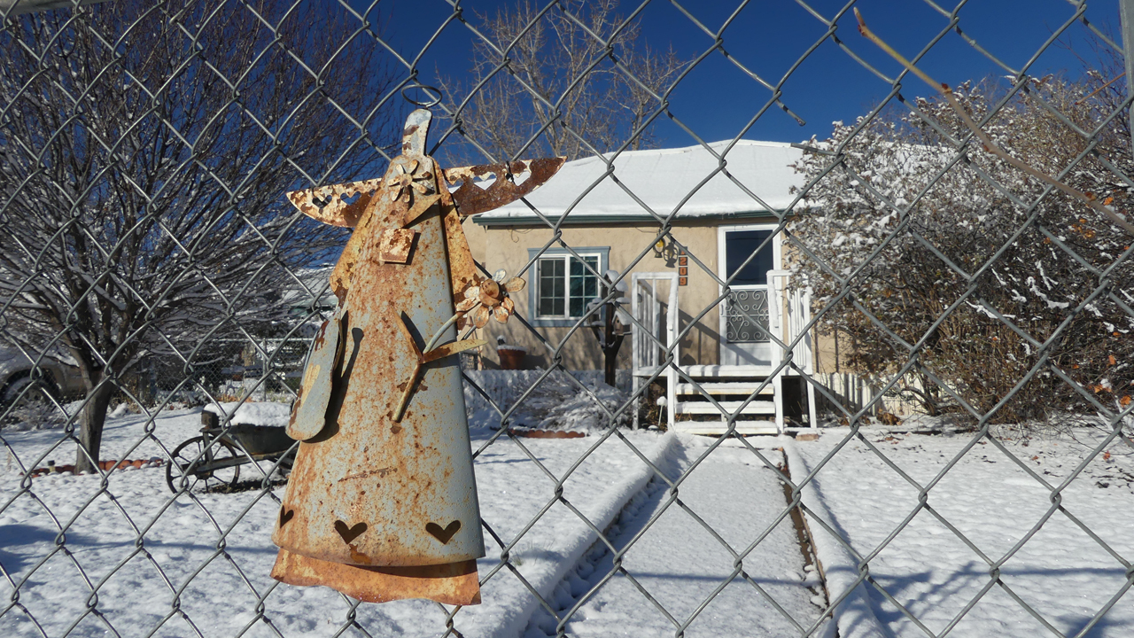 snow angel on the fence