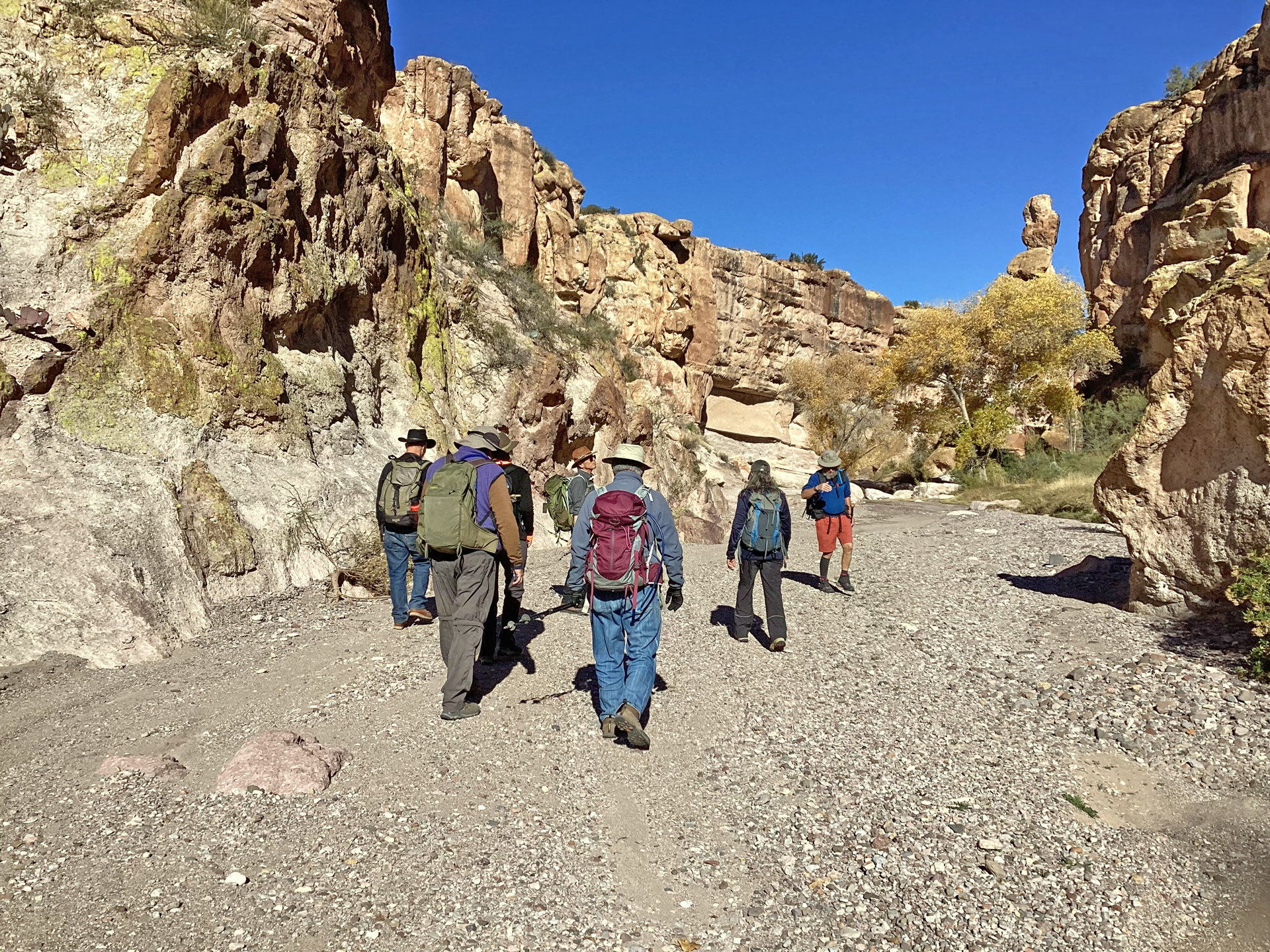 hikers working their way down canyon