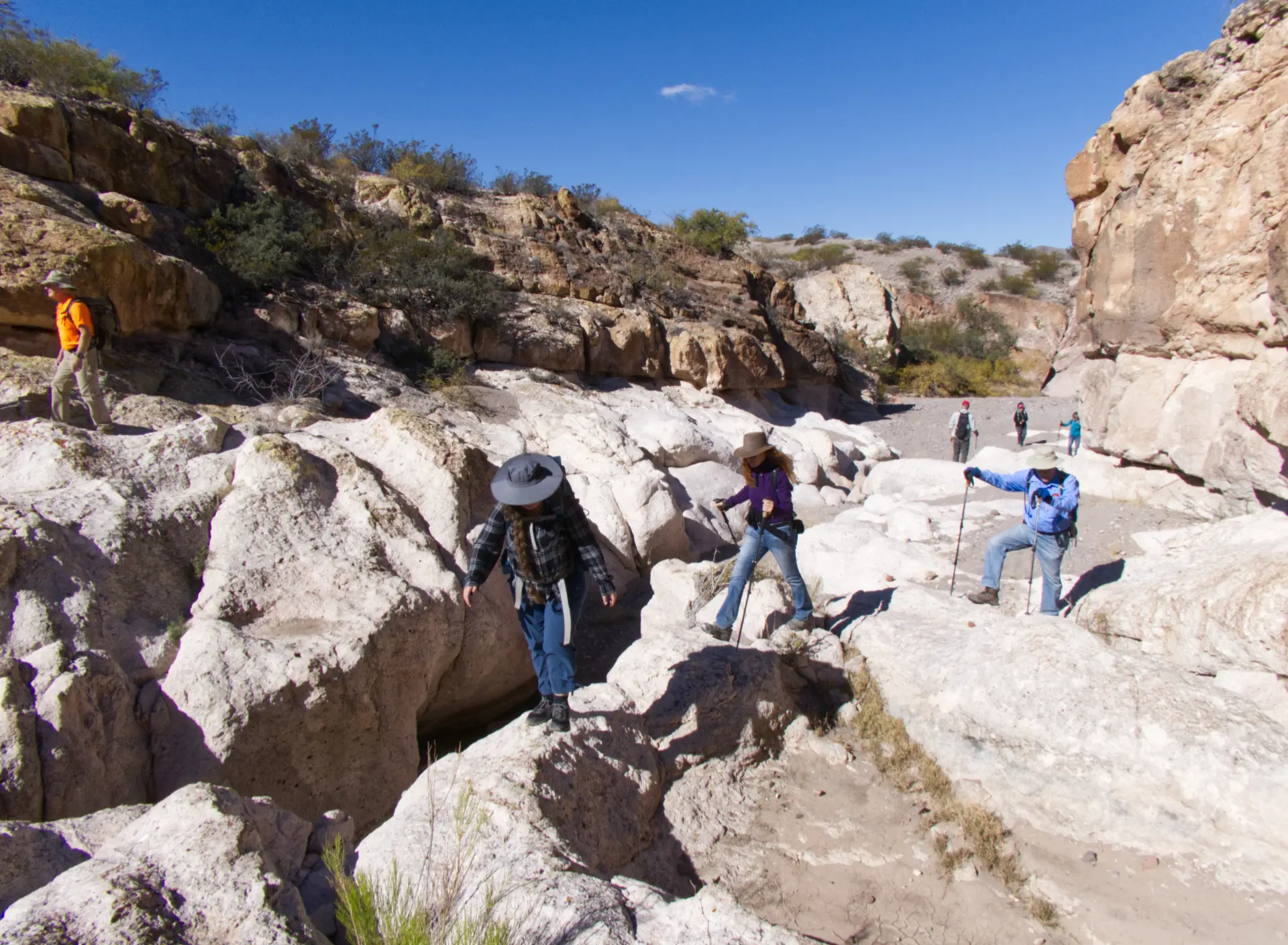 hikers coming back up throught the white rocks