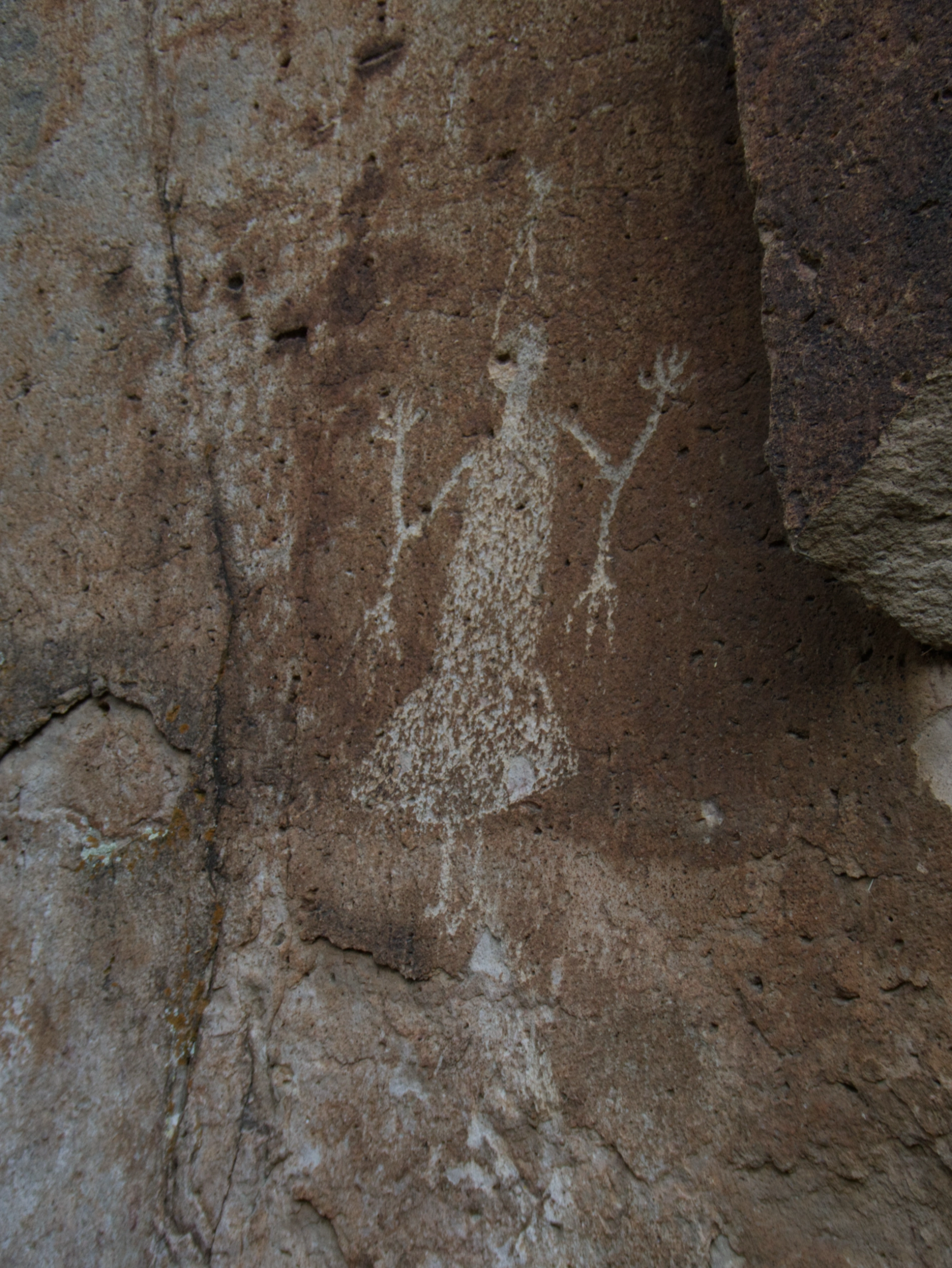 close of female figure with four hands