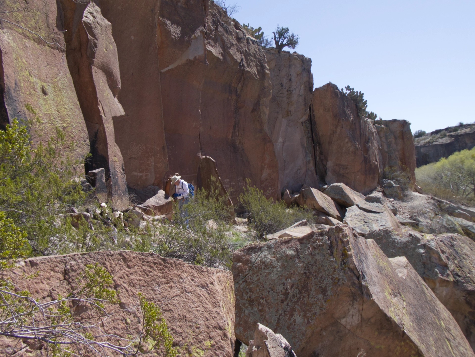 below sandstone cliffs