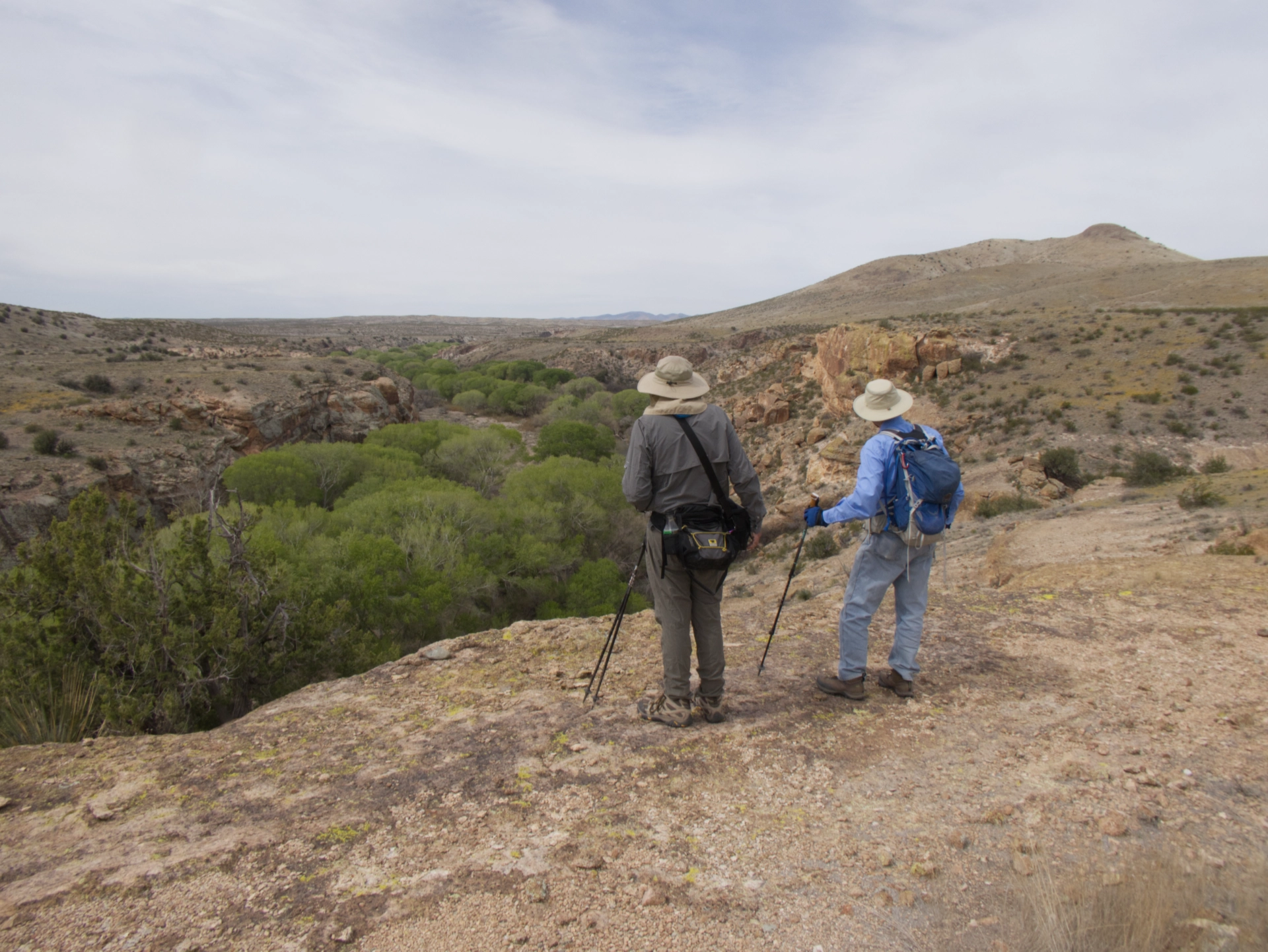 two men surveying the view downstream