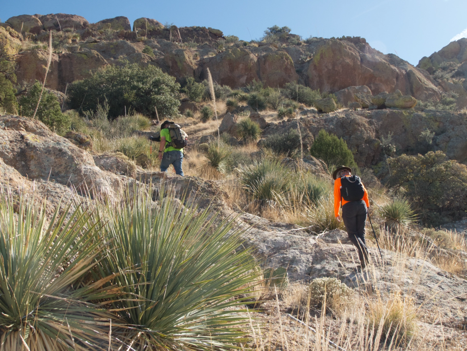 scrambling up a rocky slope