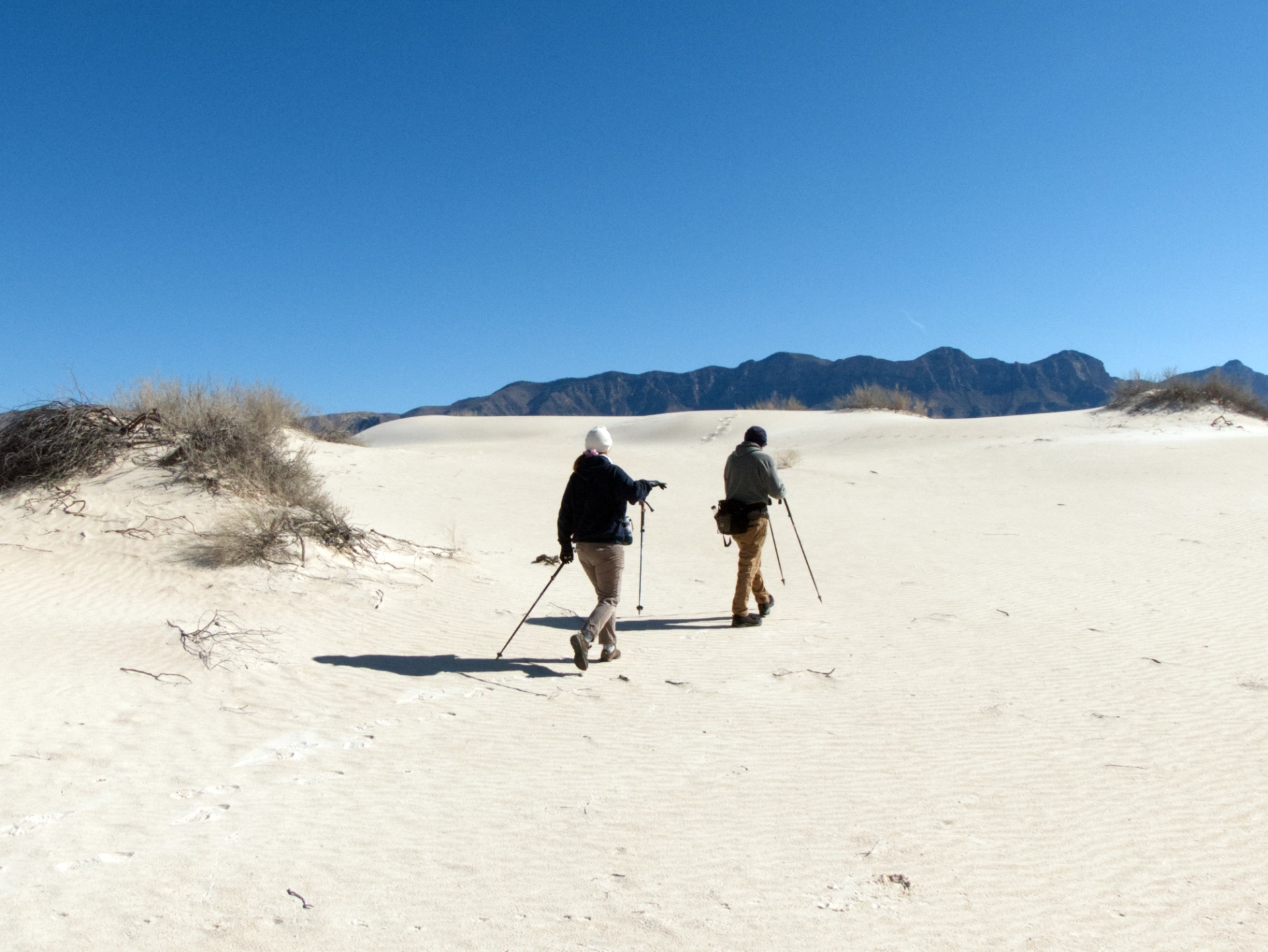 Ken and Helena hiking in the dunes
