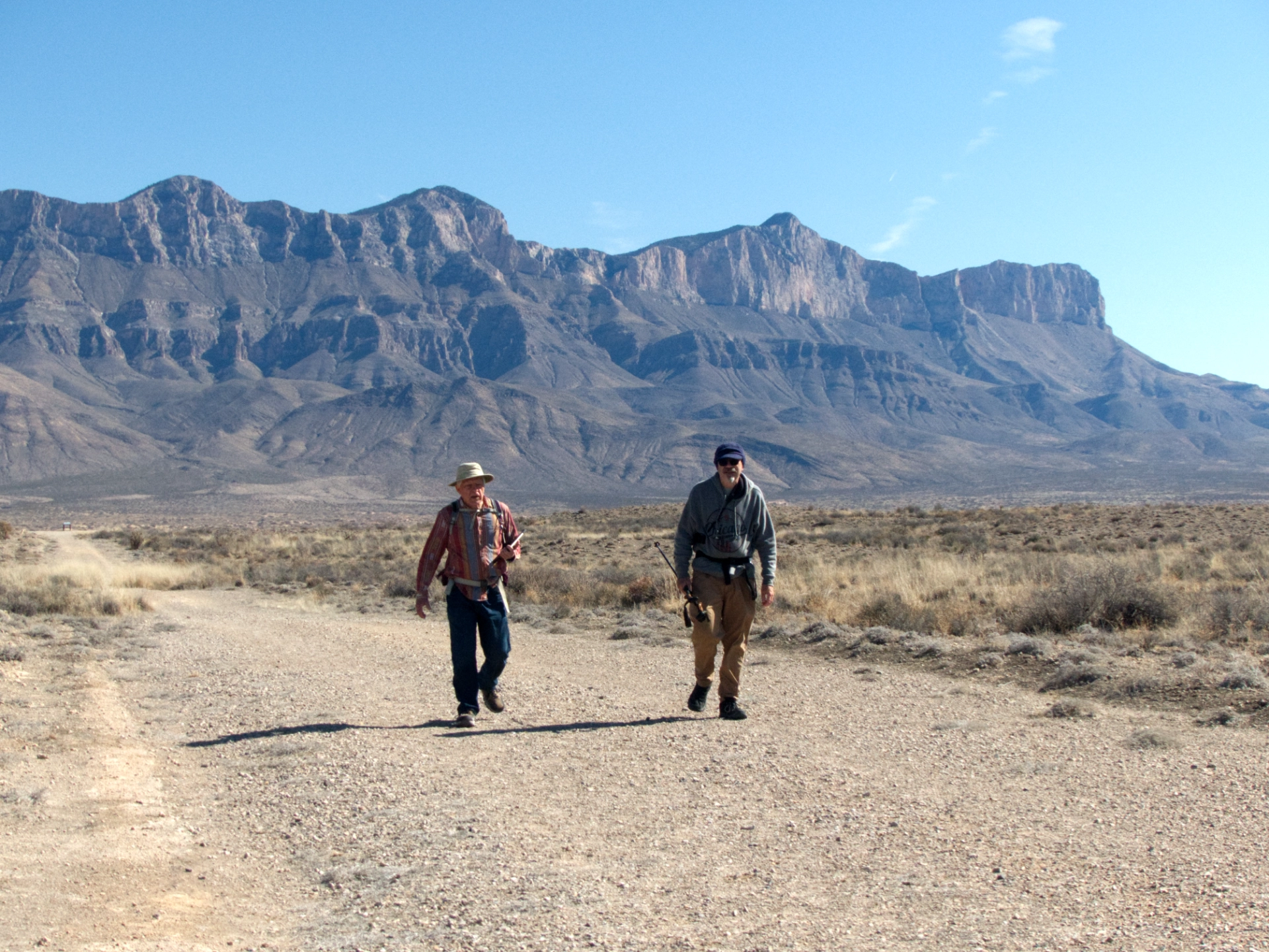 Ken and Dennis walking back to the trailhead with the Guadalupes in the distance