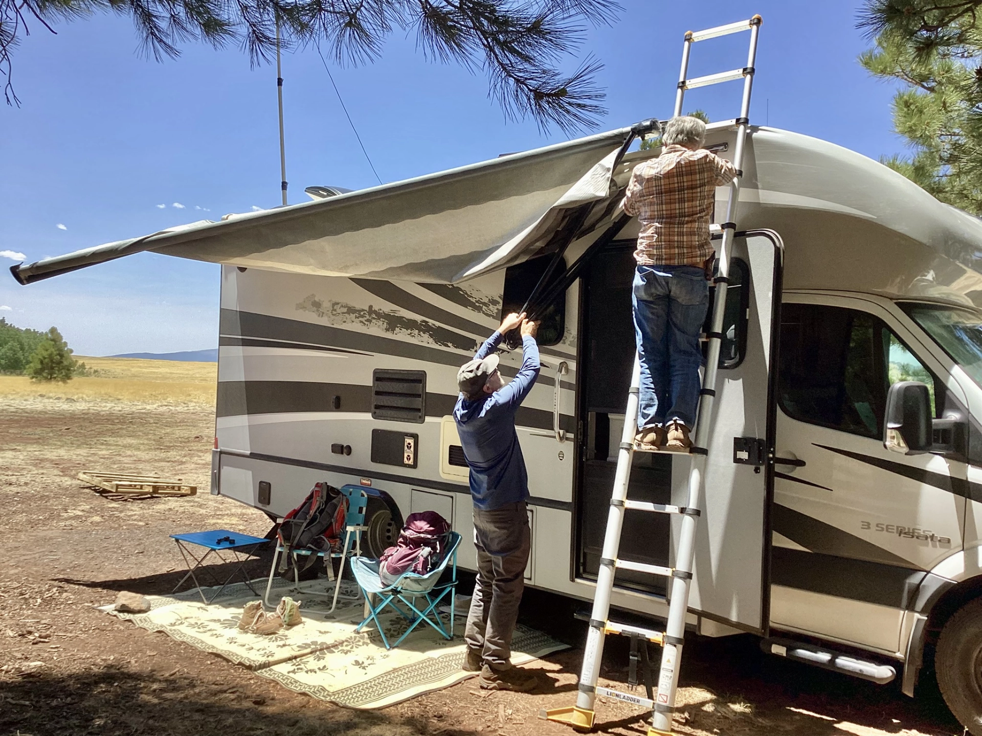 Ken and Dennis removing the awning